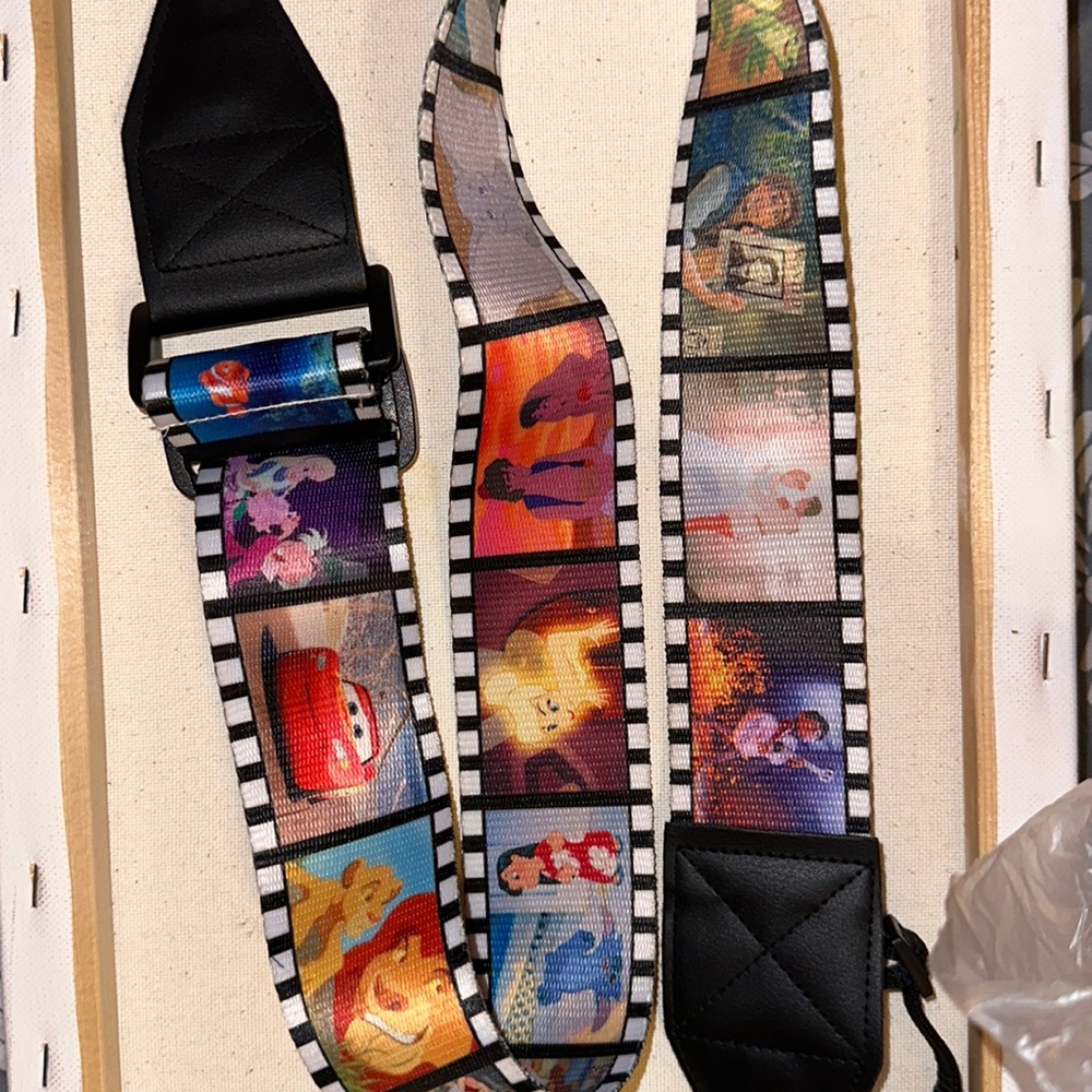 Disney camera strap, multiple movie pictures